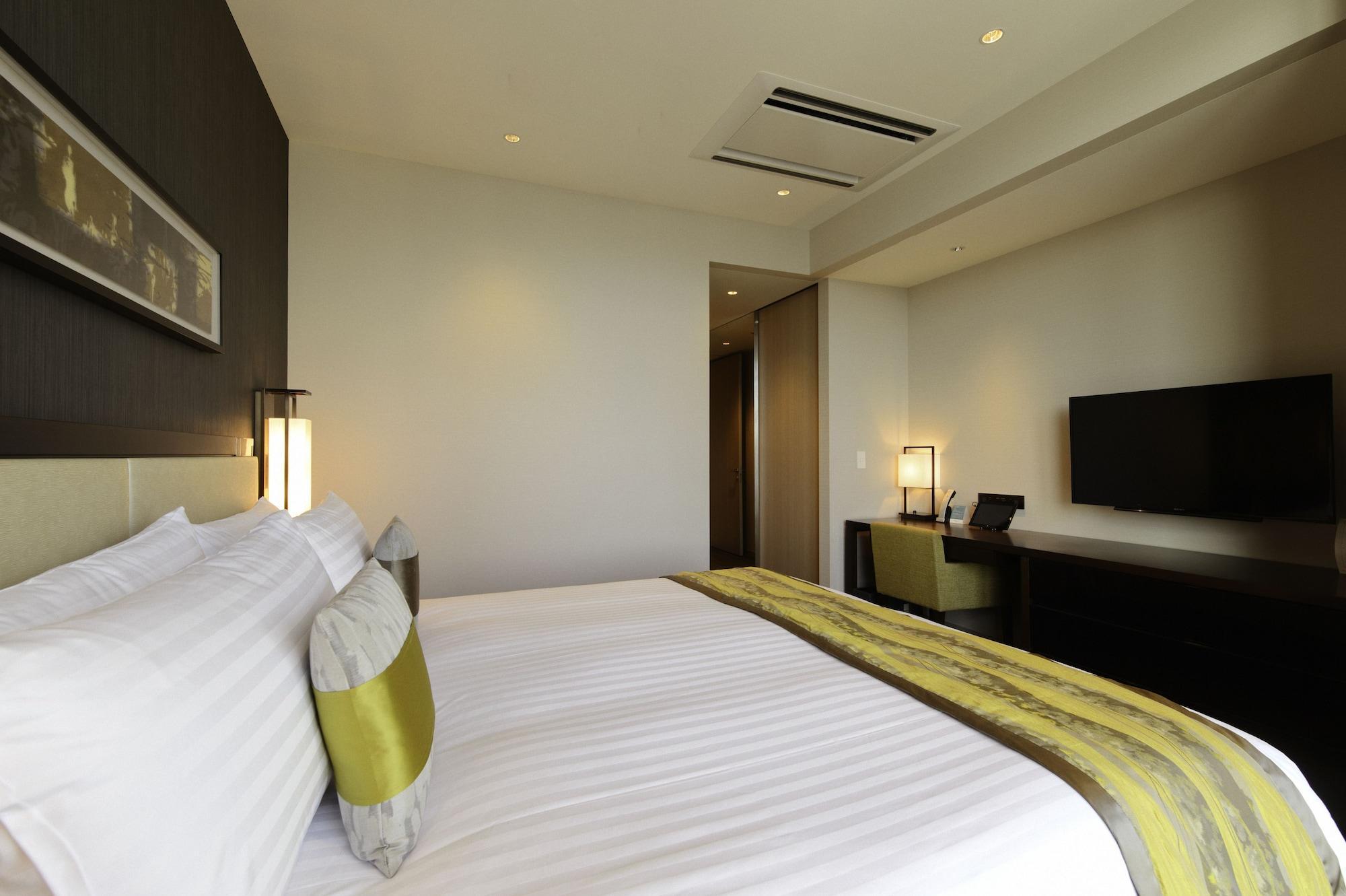 Oakwood Premier Tokyo Hotel Kültér fotó A room at the hotel