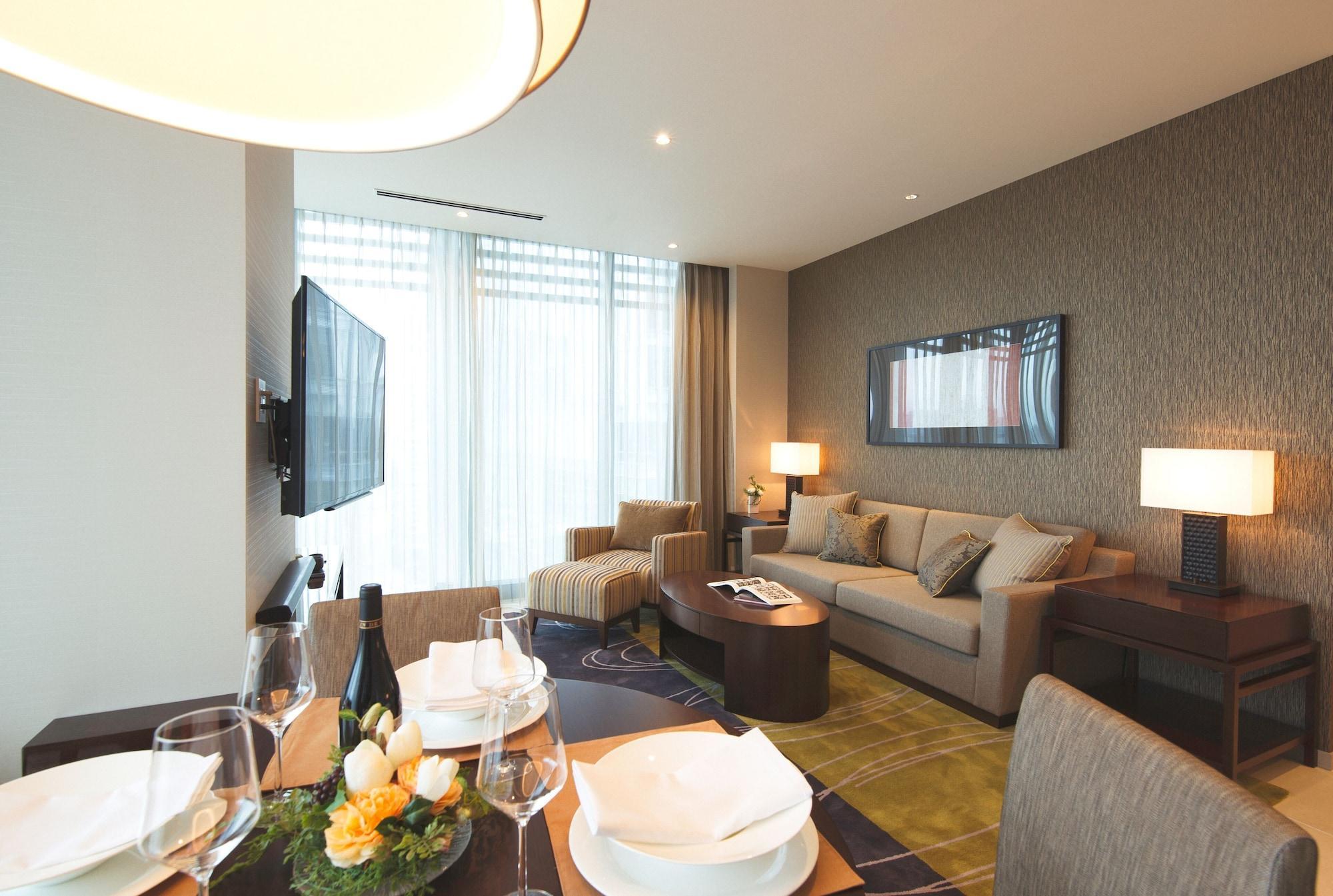 Oakwood Premier Tokyo Hotel Kültér fotó A living room at the hotel